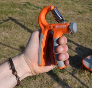 Еспандер кистьовий Power System PS-4021 з регульованим навантаженням 10-40 кг.  Power Hand Grip Orange - Зображення 10