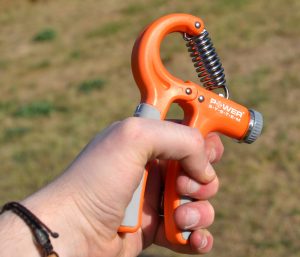 Еспандер кистьовий Power System PS-4021 з регульованим навантаженням 10-40 кг.  Power Hand Grip Orange - Зображення 7
