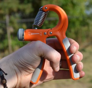 Еспандер кистьовий Power System PS-4021 з регульованим навантаженням 10-40 кг.  Power Hand Grip Orange - Зображення 6